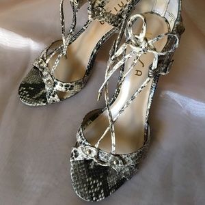 Unisa laces up high heels in reptile